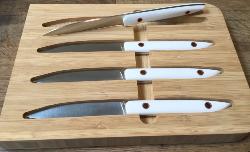 COFFRET DE 4 COUTEAUX DE TABLE ROLAND LANNIER CORIAN BLANC " TABLEWARE'S NOT DEAD"